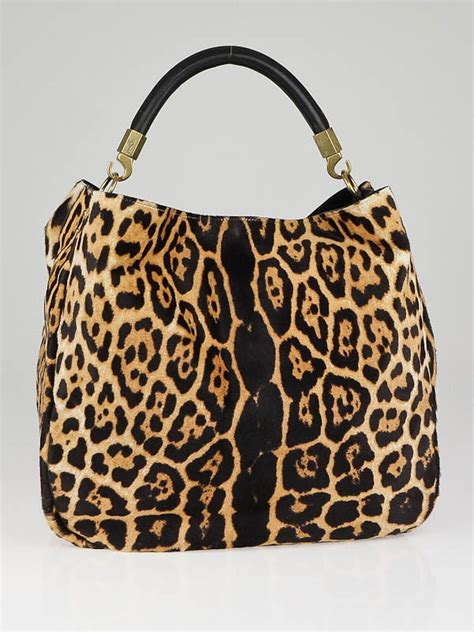 ysl calf hair leopard print bag with nailheads vintage|Vintage YSL Roady Leopard Print Calf Hair Bag – The Hosta.